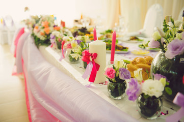 Candle with Pink Ribbons