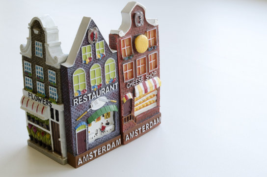 souvenirs from Holland in form of houses facades on a light background

