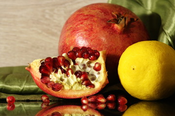 Lemon and pomegranate with grains