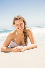 Woman lying on the beach