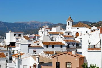 View of the town and church with mountains to the rear, Sayalonga.