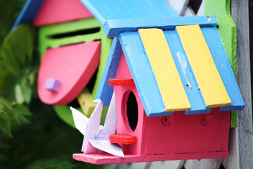 colorful wooden bird house