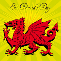 Red Welsh Dragon placed on a sunburst background along with the text St Davids day
