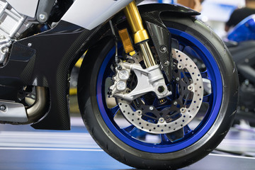 Naklejka premium Disc brake of modern motorcycle's front wheel