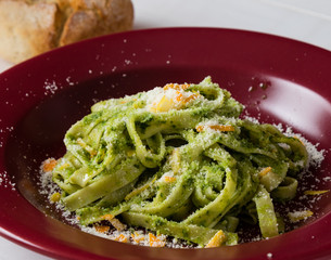tagliatelle dish in red plate