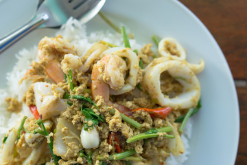 Thai stir fried curry seafood