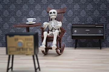 skeleton watching tv