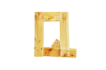 Q, One letter of wooden alphabet isolated on white