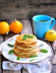 Vegetarian pancakes without eggs and sugar with coconut milk from squash and pumpkin.