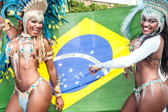 Samba dancers with brazilian flag, Rio De Janeiro, Brazil
