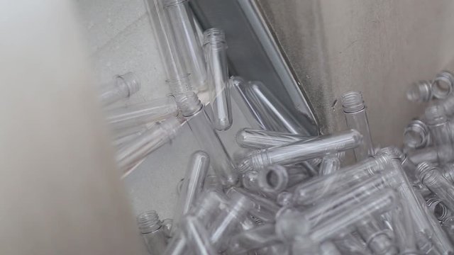 The production line of mineral water and carbonated drinks. Plastic packaging