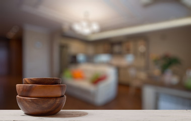stack of empty wooden bowls on table
