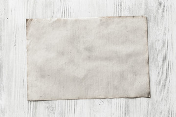 Fototapeta premium paper on wooden background