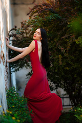 Cute brunette posing on a city street