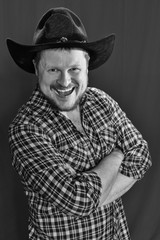 Cowboy man at plaid shirt