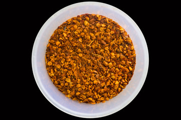 Cayenne pepper in plastic cup