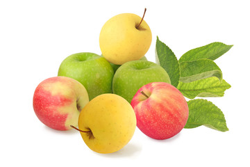 A pile of apples with sprig isolated on white