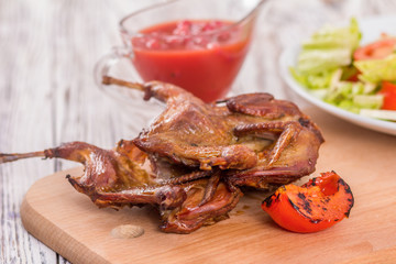 roast quail and garnish