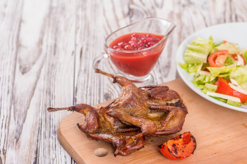 roast quail and garnish