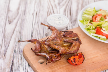 roast quail and garnish