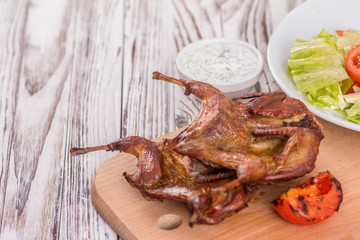 roast quail and garnish
