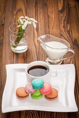 macaroon and a cup of coffee on the table