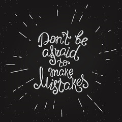 Fototapeta na wymiar Do not be afraid to make mistakes handwritten design element with swirls. Hand drawn lettering quote on black background for motivation and inspirational poster, t-shirt and banners