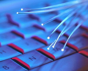 Computer key board with optical fibres which are used to carry images, or high volumes of data