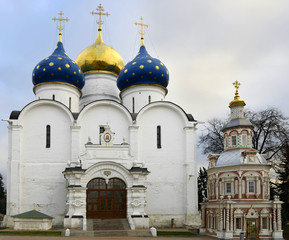 Fototapeta na wymiar Assumption Cathedral (1559 - 1585) and chapel. Architectural Ensemble of the Trinity Sergius Lavra in Sergiev Posad