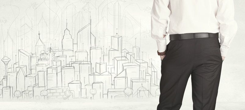 Businessman with drawn city view