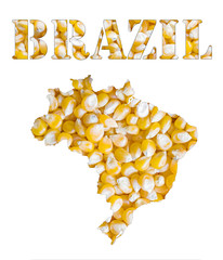 A texture of yellow corn maize seeds with the shape of the word Brazil and the country geographical map outline. Image isolated on a white background.