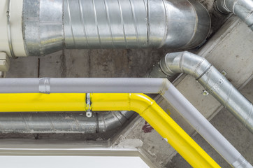 galvanized, grey and yellow pipes, ventillation and water and gas system