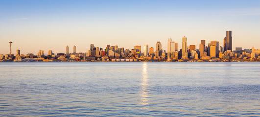 Seattle skyline panorama and Elliott Bay at sunset, Seattle, Washington, USA