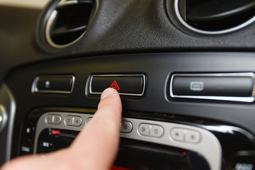 Obraz na płótnie Canvas emergency button on car dashboard