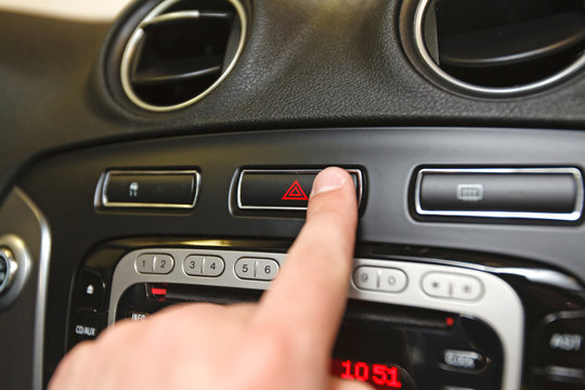emergency button on car dashboard