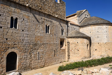 Fototapeta na wymiar Apse and Gothic facade of the monastery of Vilabertran, Alt Emporda, Catalonia,Spain