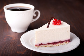 piece of cheesecake with coffee