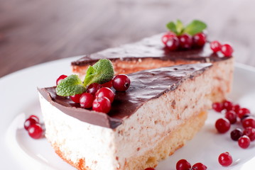 piece of cake on a saucer and chocolate glaze