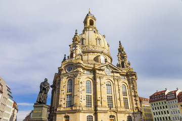 Fototapeta na wymiar Dresden - view of Frauenkirche cathedral and statue of Martin Luther