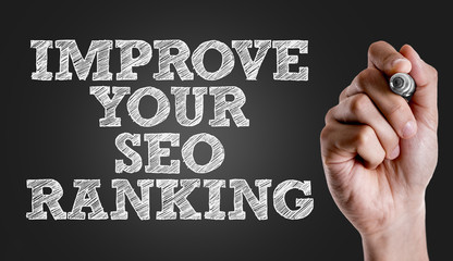 Hand writing the text: Improve Your SEO Ranking