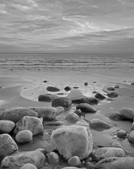 Beach rocks leading to the sea