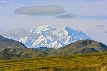 High Mountain Appearing Above a Ridge