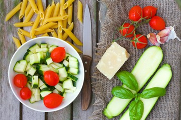 Ingredients for preparing Italian pasta dish. Top view