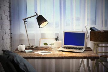 Modern workplace on light background