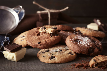Chocolate chip cookies on wooden background