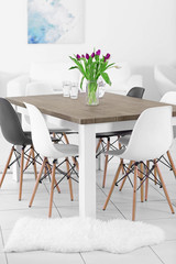 Modern living room with table and chairs