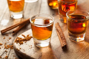 Printed kitchen splashbacks Bar Cinnamon Whiskey Bourbon in a Shot Glass
