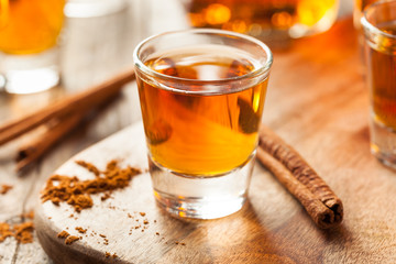 Cinnamon Whiskey Bourbon in a Shot Glass