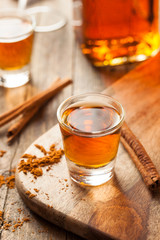 Cinnamon Whiskey Bourbon in a Shot Glass