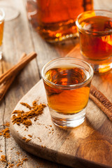 Cinnamon Whiskey Bourbon in a Shot Glass